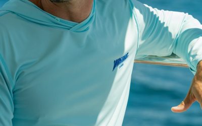 Hooded Fishing Shirt vs Crew Neck: Which Is Better For Your Offshore Crew?