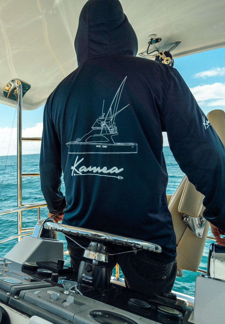 Custom boat shirt featuring a detailed boat redraw printed on the back of a Mkaira premium gamefishing shirt.